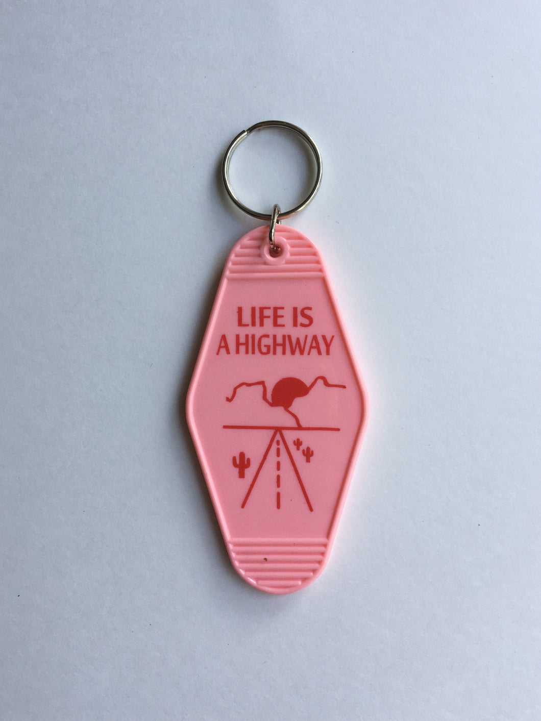 LIFE IS A HIGHWAY MOTEL KEYCHAIN